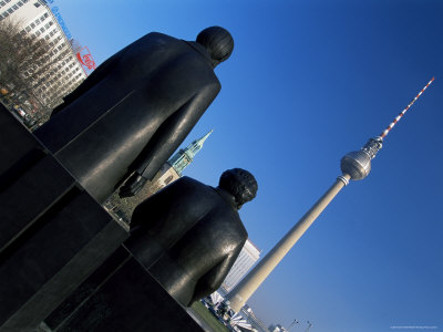 252-5635statues-of-marx-and-engels-with-tv-tower-or-fernsehturm-beyond-berlin-germany-posters.jpg